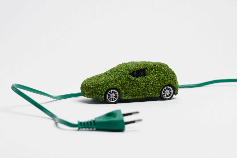 Low_ecological-electric-car-on-white-background-NXKSYEL